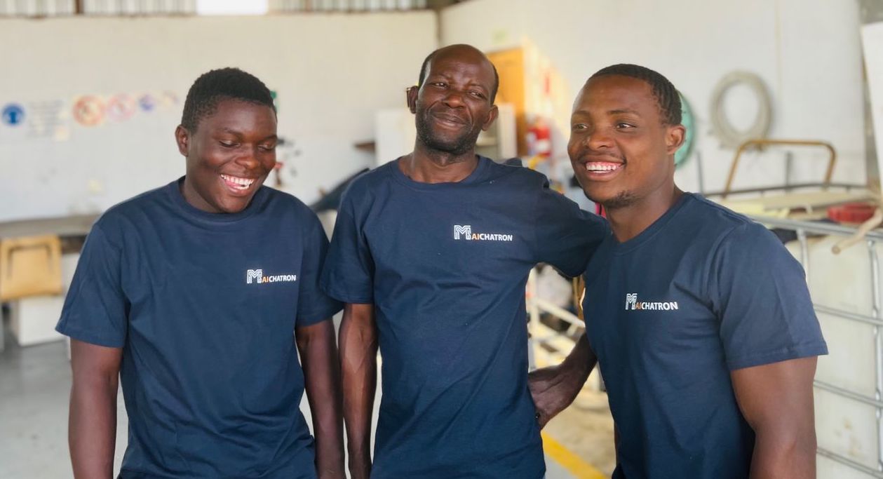 MAichatron staff members smiling