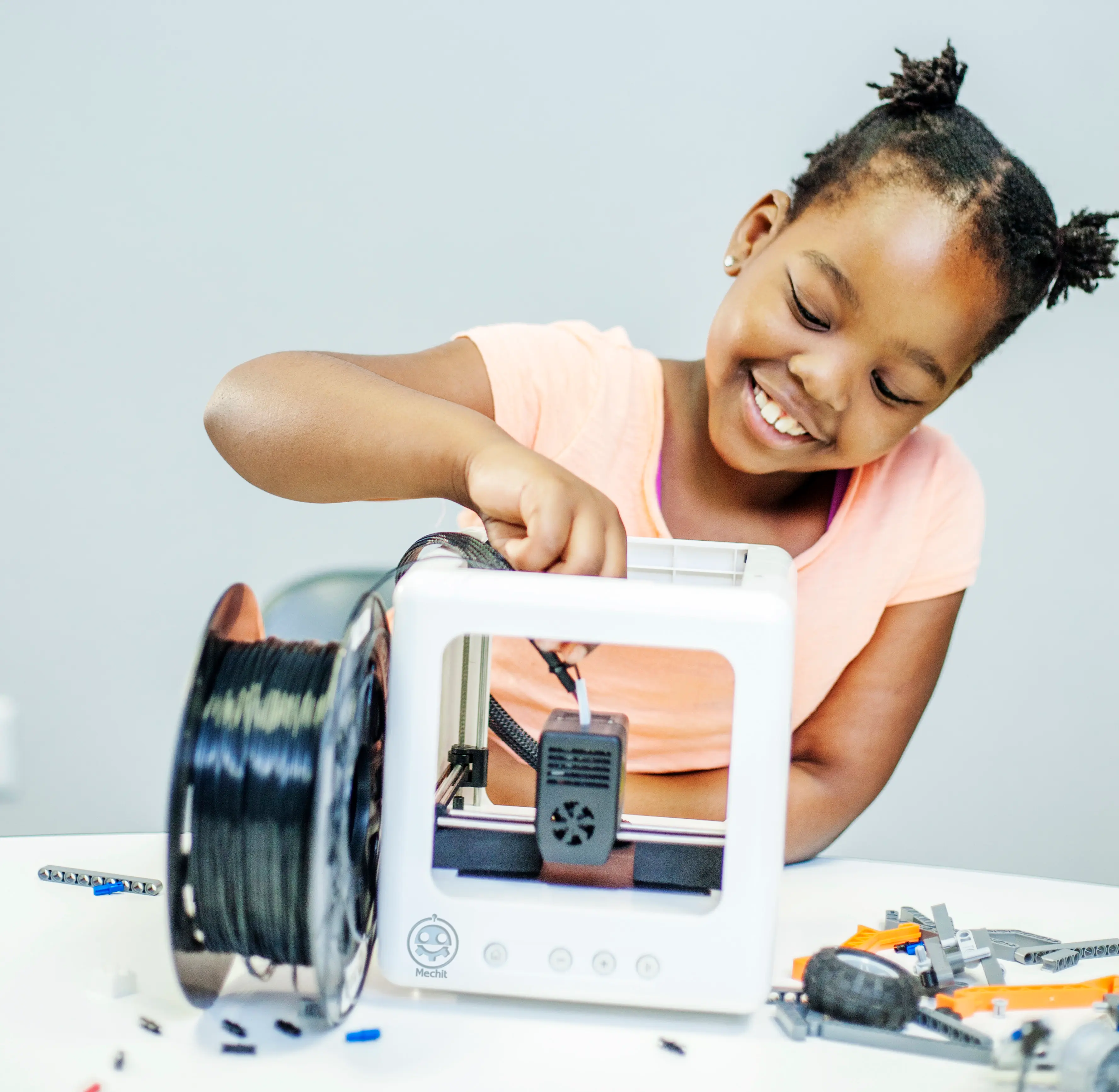 A child exploring a piece of equipment
